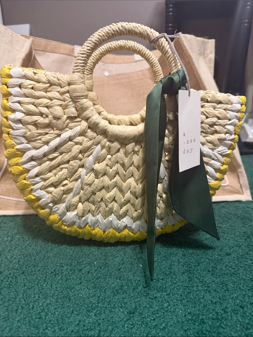 a new day Yellow, Cream & White Woven Straw Tote with Green Ribbon